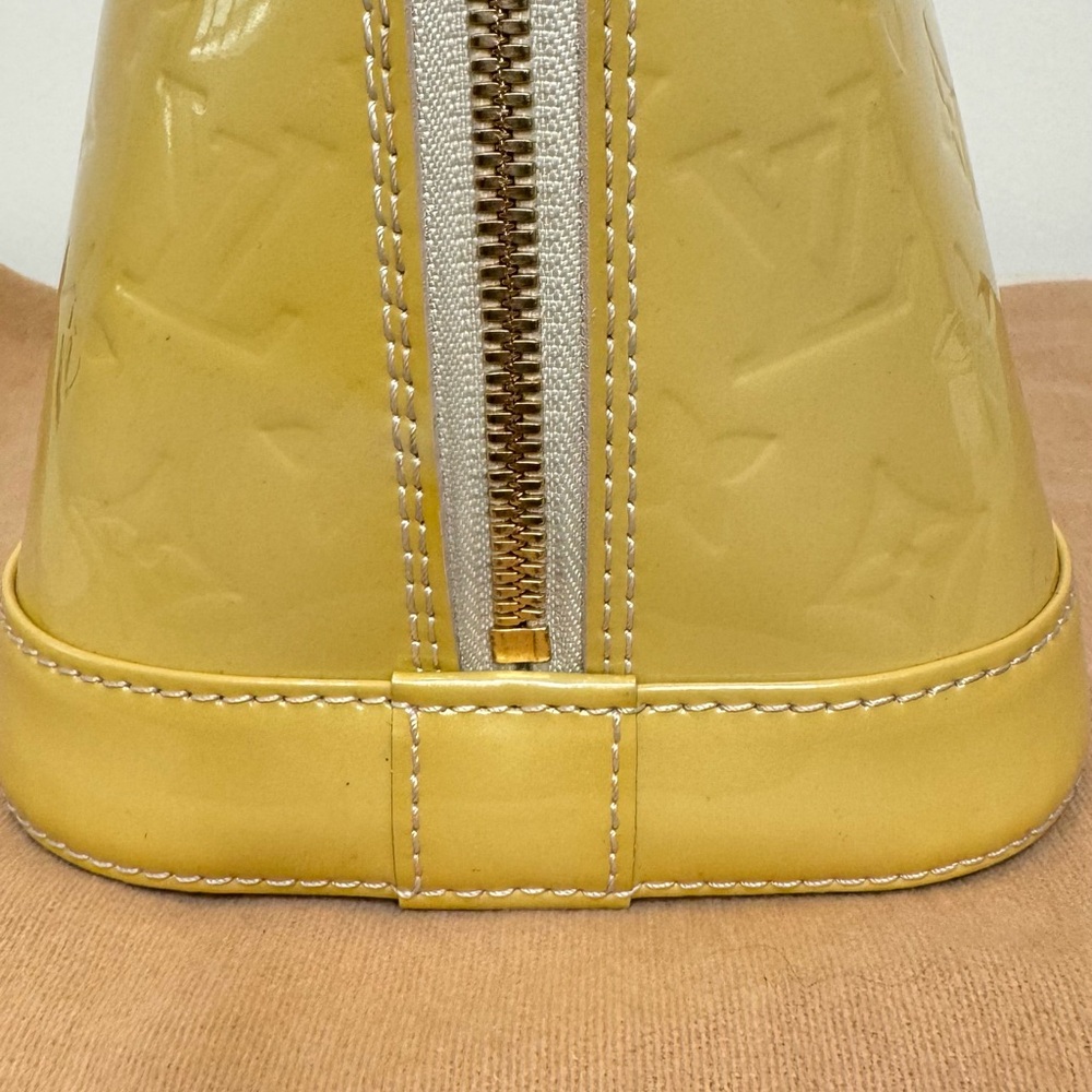 SOLD
Louis Vuitton Monogram Vernis Alma PM Satchel - Picture 13 of 14